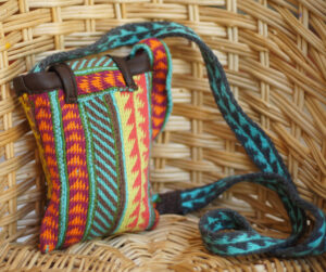 Tablet woven bag by sewing various straps together