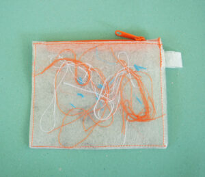 recycled zipper bag made of discarded plastic bags