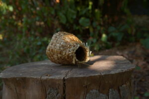 dandelion flower stalks conical handmade basket
